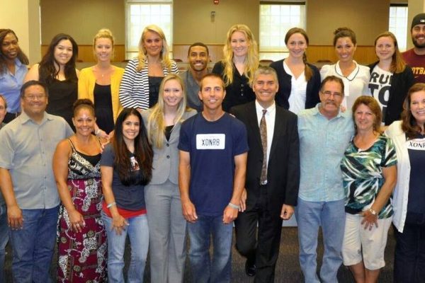 Courtney, posing with his family, and the entire California Innocence Project team after his release.
