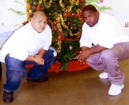 McKoy and his son Lamont Jr. during a Christmas visit in prison in the early 2000s.