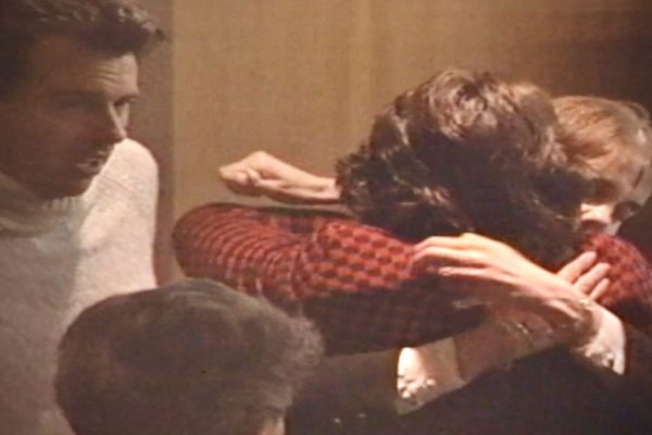 Natalie Beard's mother Cindy hugs Assistant District Attorney Gretchen Hayward after a jury found Edmunds guilty of first degree reckless homicide in November 1996. Beard's father, Tom, looks on.